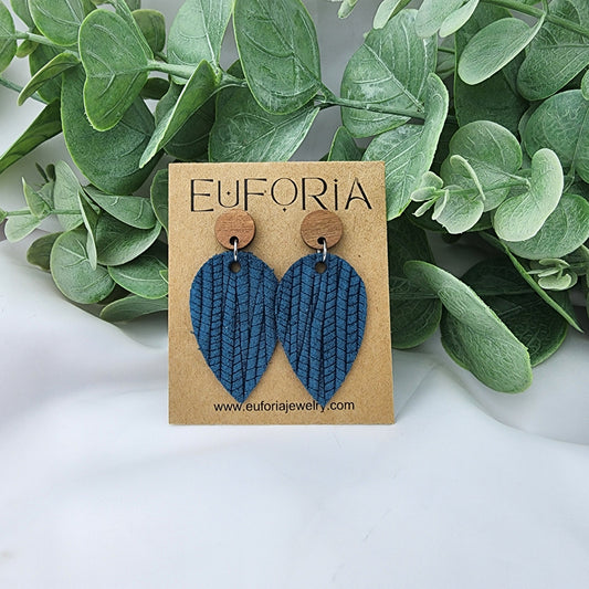 Light as a feather leather teardrop earrings. Dark teal, woven palm leaf texture